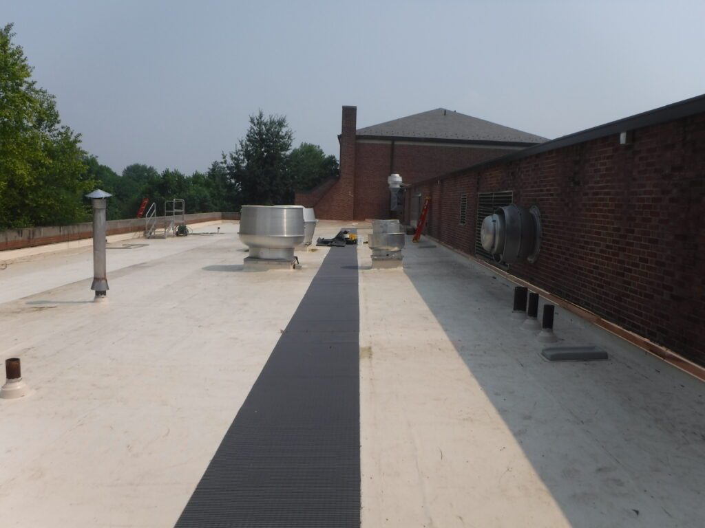 GSM removed and replaced the units, duct work, and infilled the deck